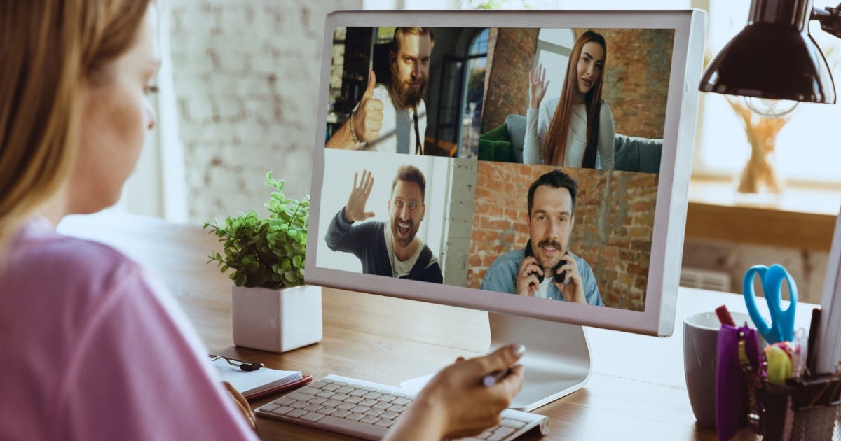 Person working remotely on a laptop at home